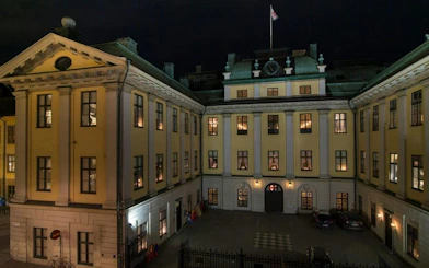 Stockholm building at night, part of the Secret Societies self-guided city exploration game.