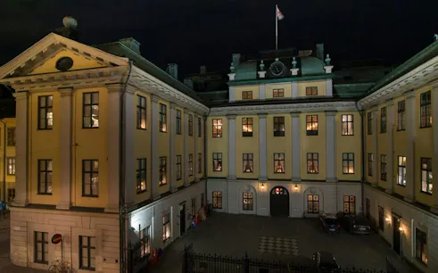 Stockholm building at night, part of the Secret Societies self-guided city exploration game.