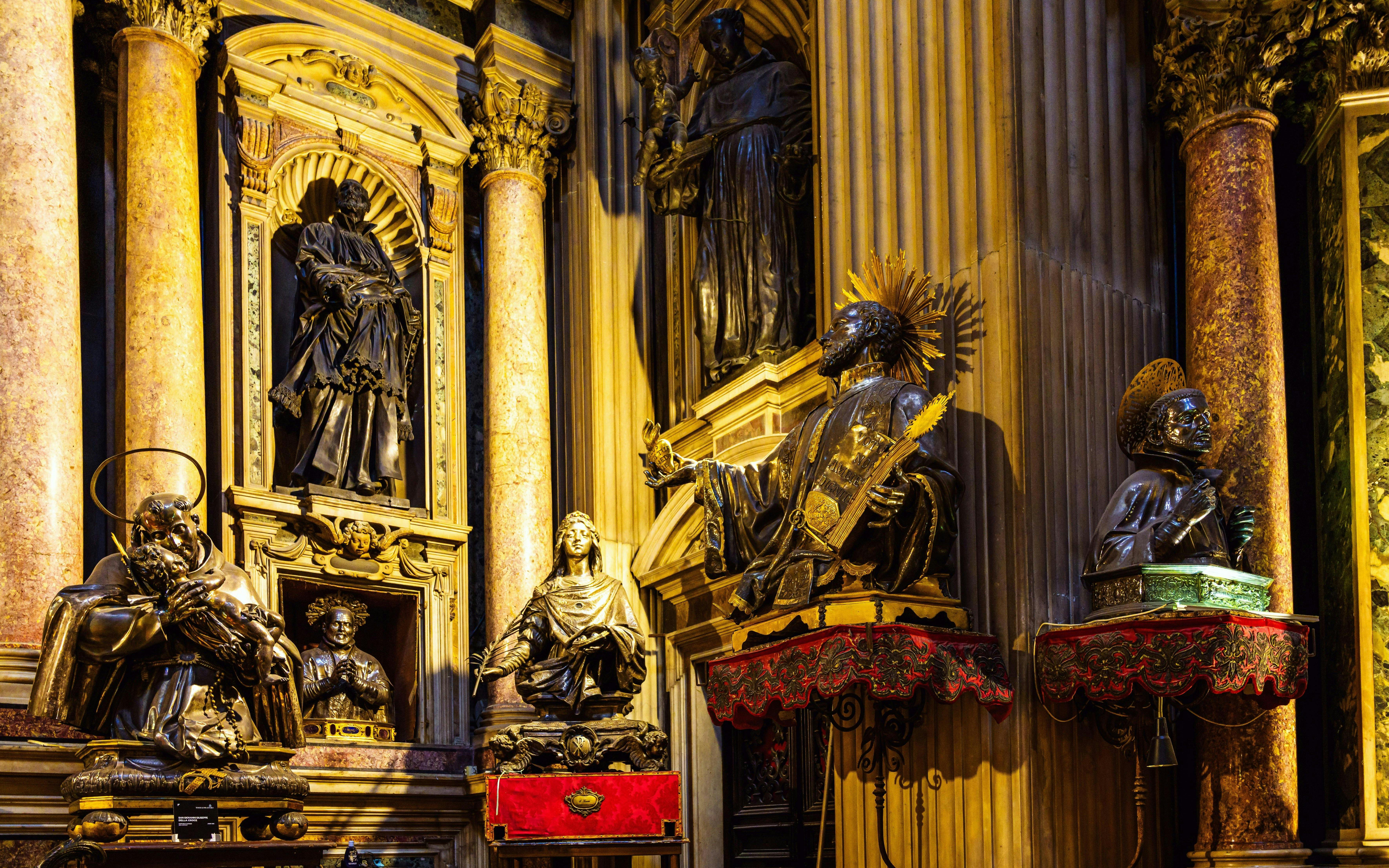 Statues and ornate columns inside the Royal Chapel of the Treasure of San Gennaro, Naples.
