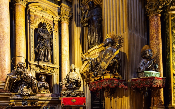 Statues and ornate columns inside the Royal Chapel of the Treasure of San Gennaro, Naples.