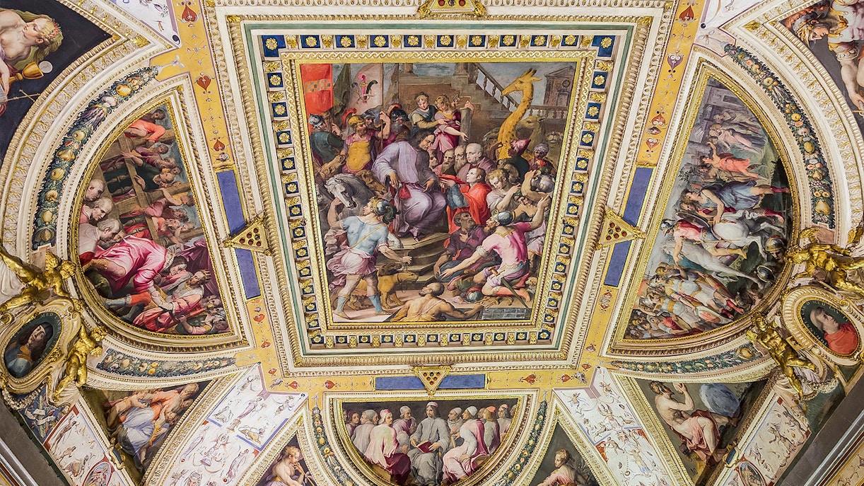 The Hall of Geographical Maps in Palazzo Vecchio, Florence, showcasing historic map displays.