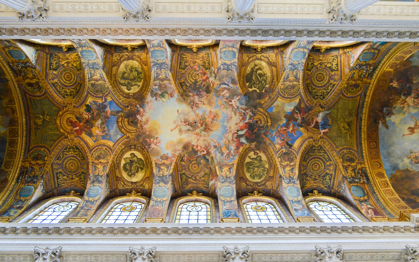 Ceiling artwork in Royal Chapel, Palace of Versailles, France, showcasing intricate religious frescoes.