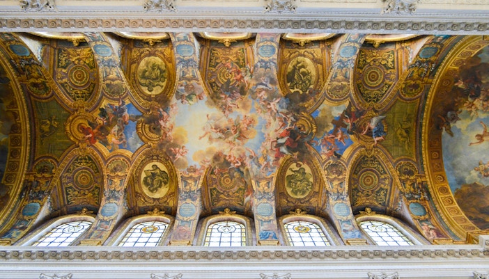 Ceiling artwork in Royal Chapel, Palace of Versailles, France, showcasing intricate religious frescoes.