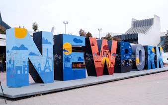 Newborn Monument with colorful graffiti, Pristina, Kosovo.