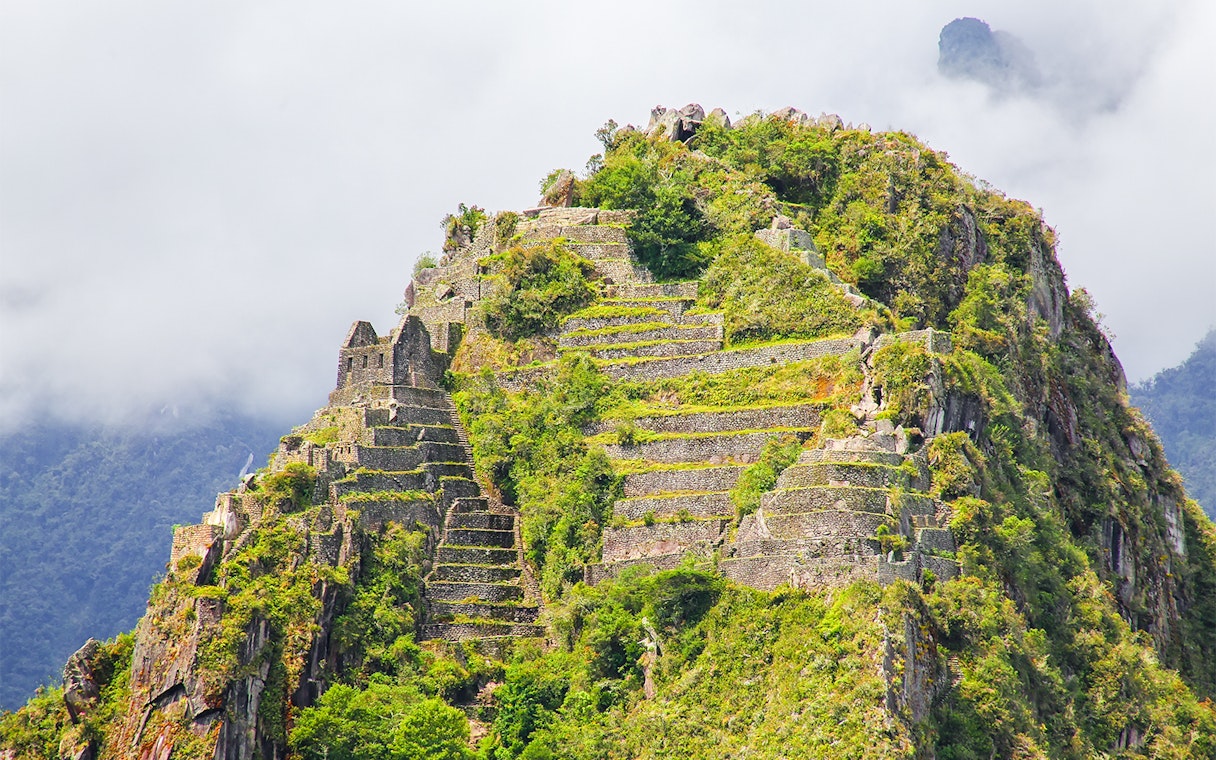 Wayna Picchu terraces and ruins at Machu Picchu, Peru.
