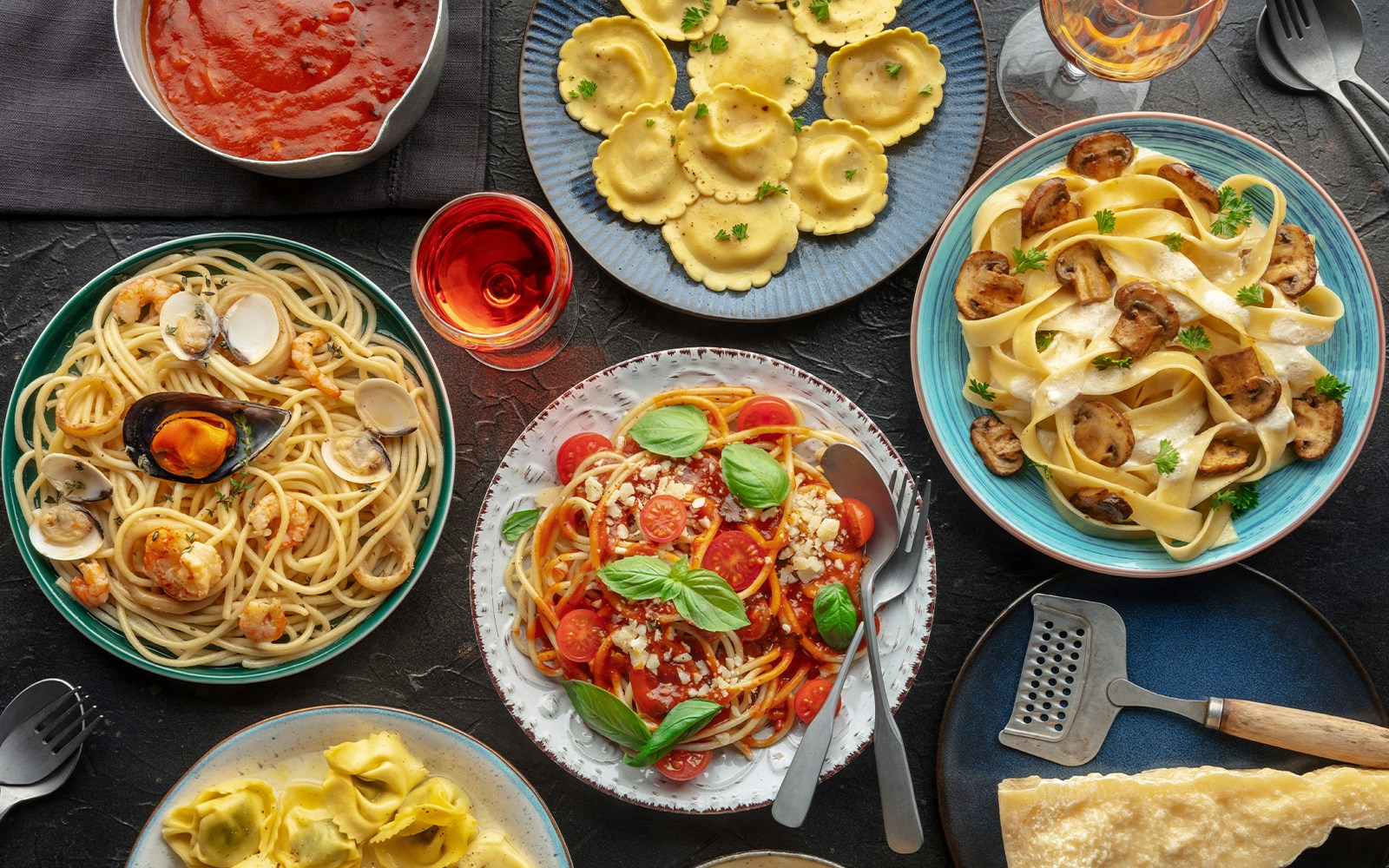 Pasta dish with tomato sauce and basil, representing Italian cuisine.