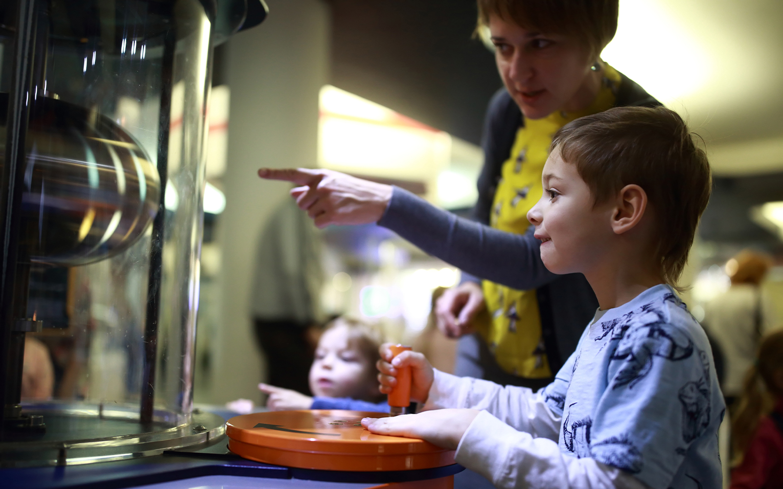 Child interacting with exhibit at NEMO Science Museum, Amsterdam.