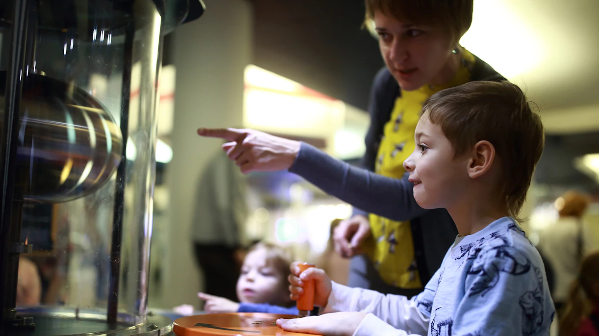 Child interacting with exhibit at NEMO Science Museum, Amsterdam.