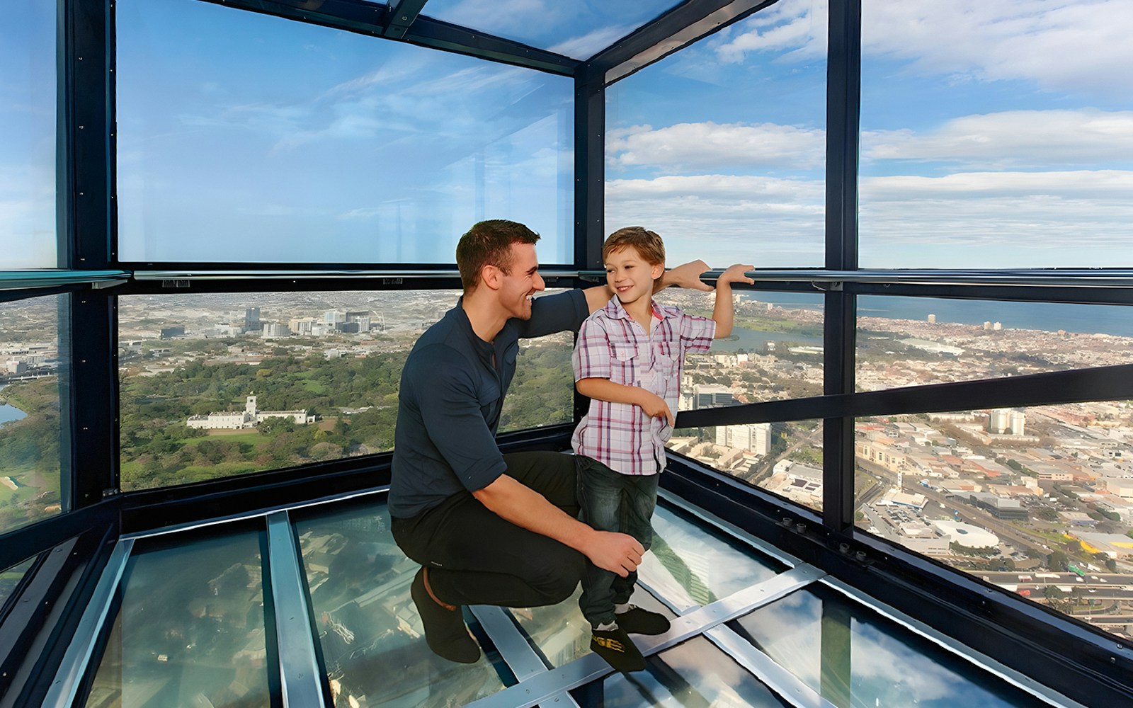 Family enjoying view from Melbourne Skydeck at Eureka Tower.