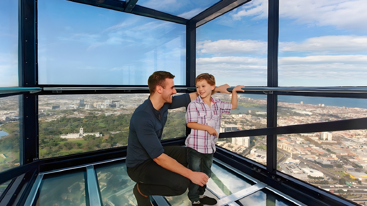 Family enjoying view from Melbourne Skydeck at Eureka Tower.