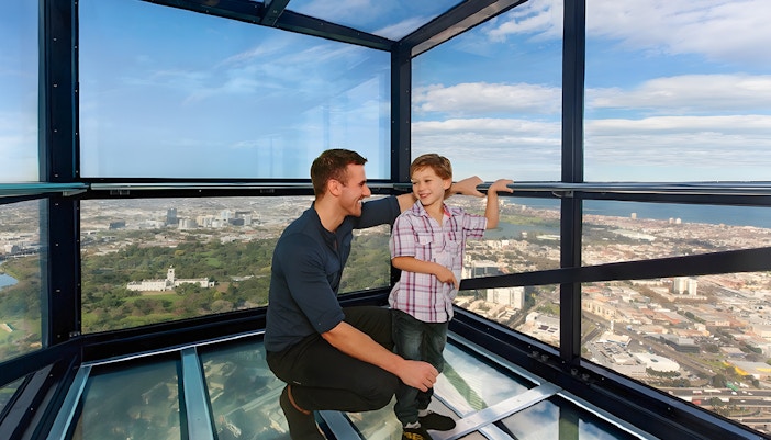 Family enjoying view from Melbourne Skydeck at Eureka Tower.