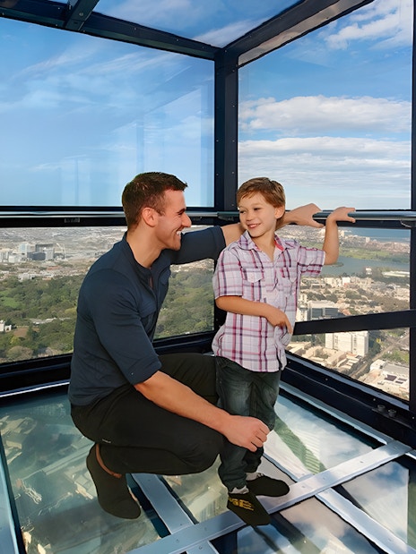 Family enjoying view from Melbourne Skydeck at Eureka Tower.