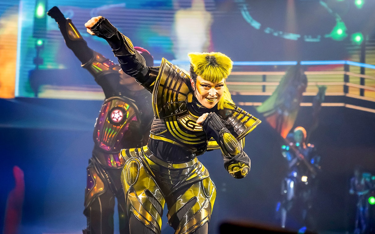 Performer in futuristic costume during Starlight Express show.