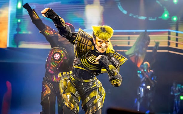 Performer in futuristic costume during Starlight Express show.