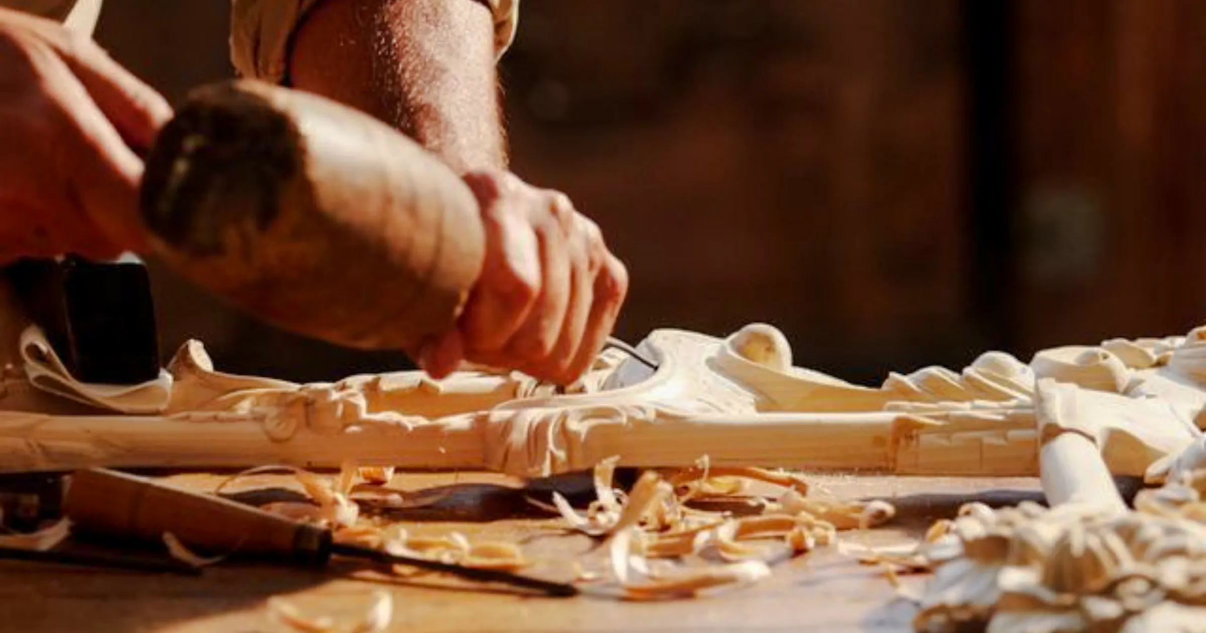 Wood carving in progress at a workshop in Ben Guerir, Marrakesh.