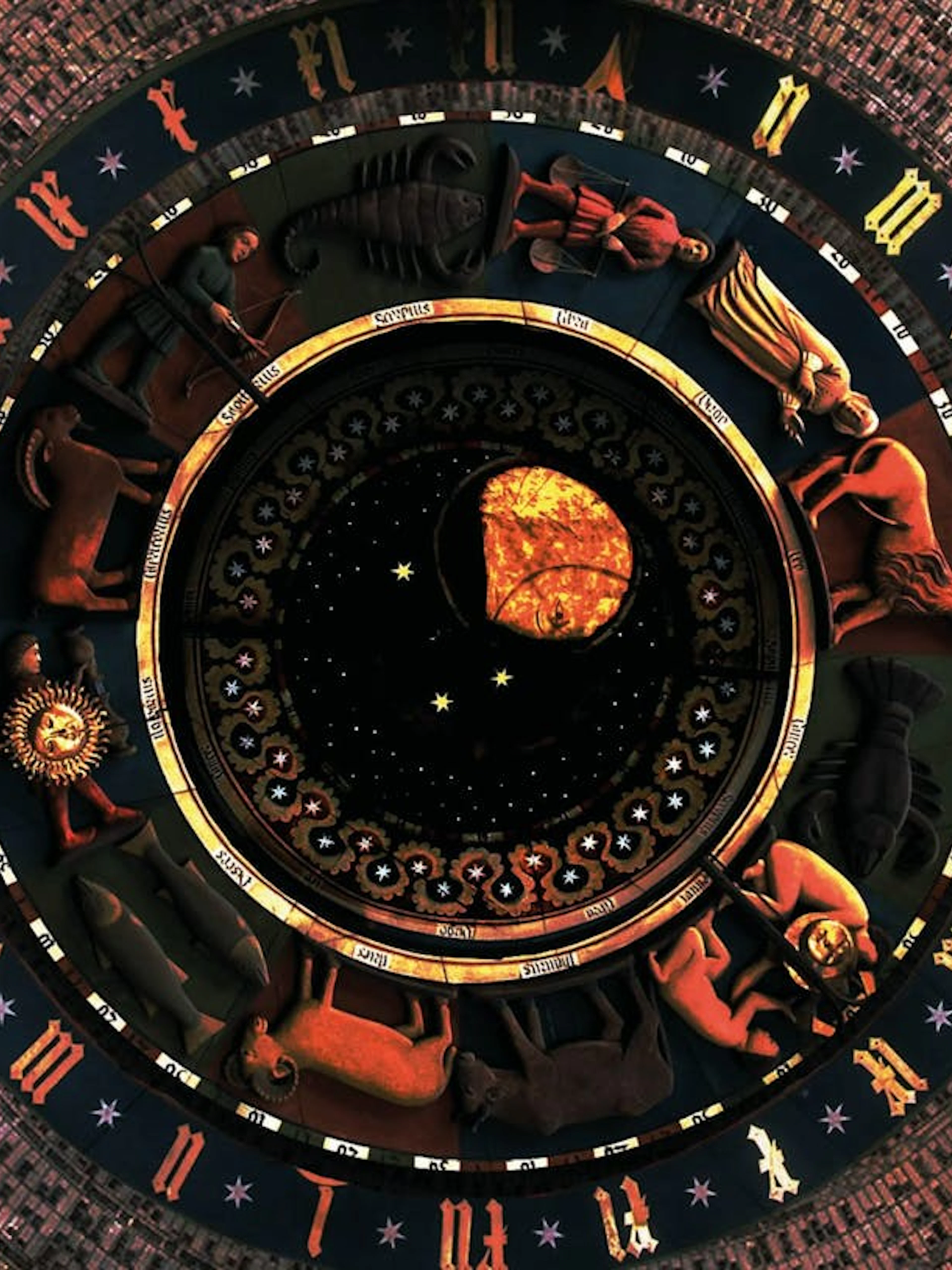 Astronomical clock face with zodiac signs in Gdansk for self-guided city exploration game.
