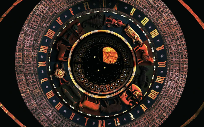 Astronomical clock face with zodiac signs in Gdansk for self-guided city exploration game.