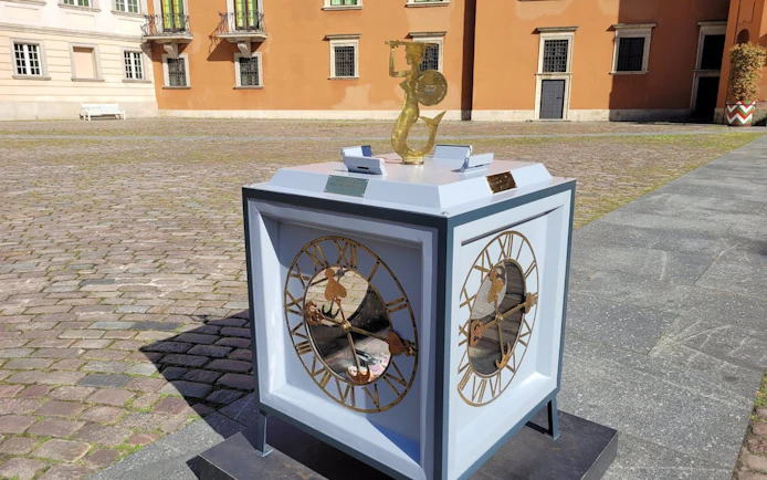 Clock sculpture in the courtyard of Royal Castle, Warsaw, during a private guided tour.
