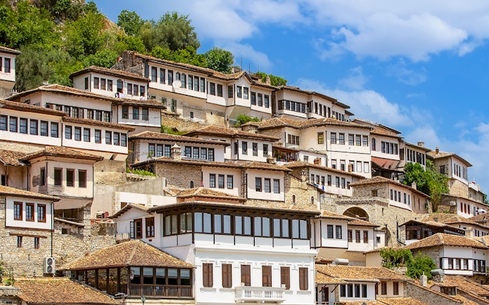 Ottoman-style houses on a hillside in Berat, Albania, known as the city of a thousand windows.
