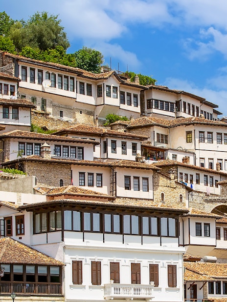 Ottoman-style houses on a hillside in Berat, Albania, known as the city of a thousand windows.