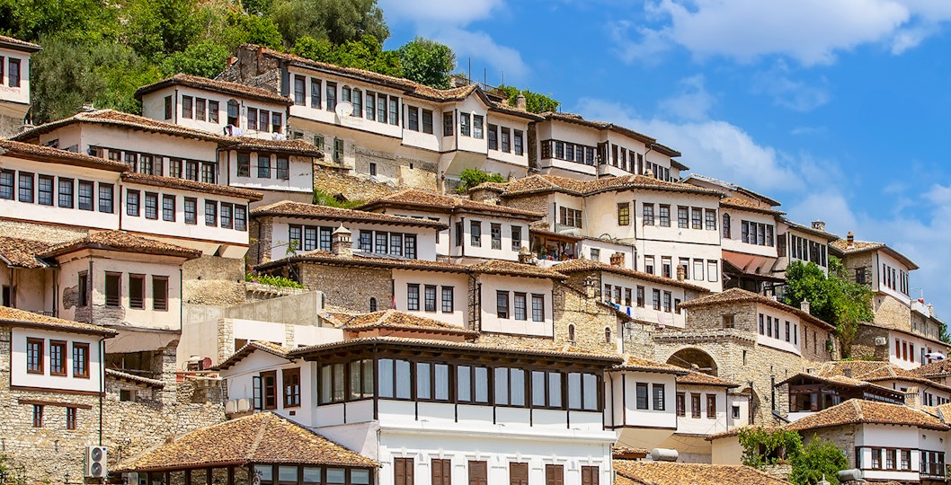 Ottoman-style houses on a hillside in Berat, Albania, known as the city of a thousand windows.