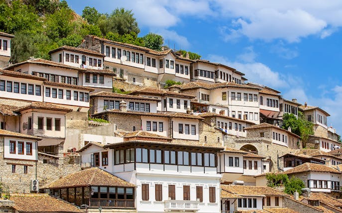 Ottoman-style houses on a hillside in Berat, Albania, known as the city of a thousand windows.