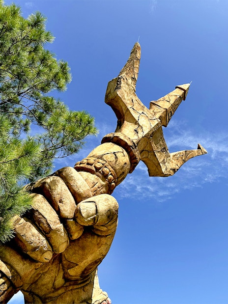 Trident held by a statue's hand at The Lost Continent, Islands of Adventure, Universal Orlando.