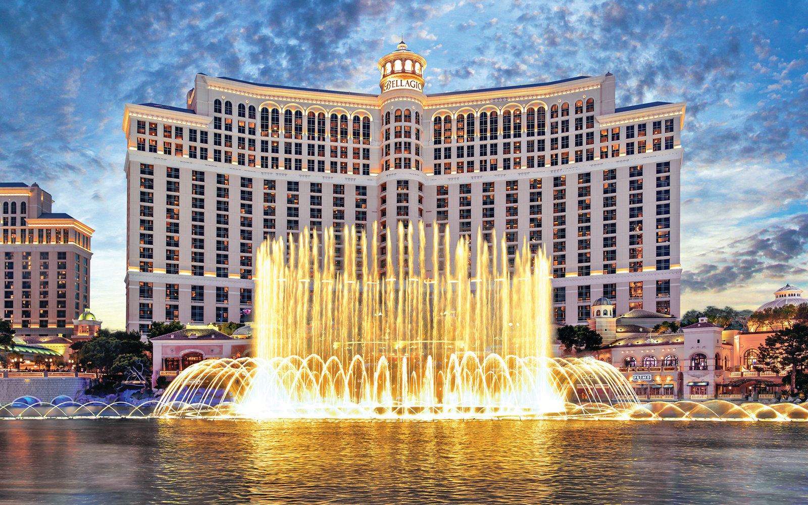 Bellagio Hotel and Fountains in Las Vegas at dusk.
