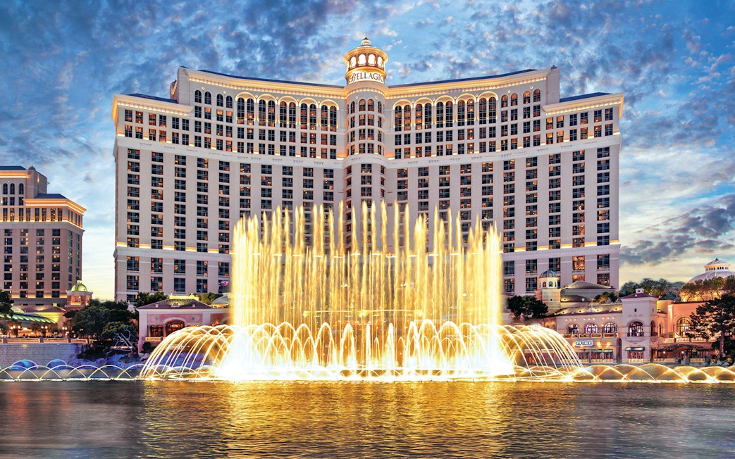 Bellagio Hotel and Fountains in Las Vegas at dusk.