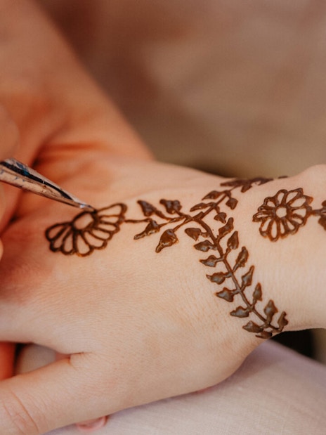 Henna tattoo being applied at Bedouin Desert Camp by Atlanta Tourism.