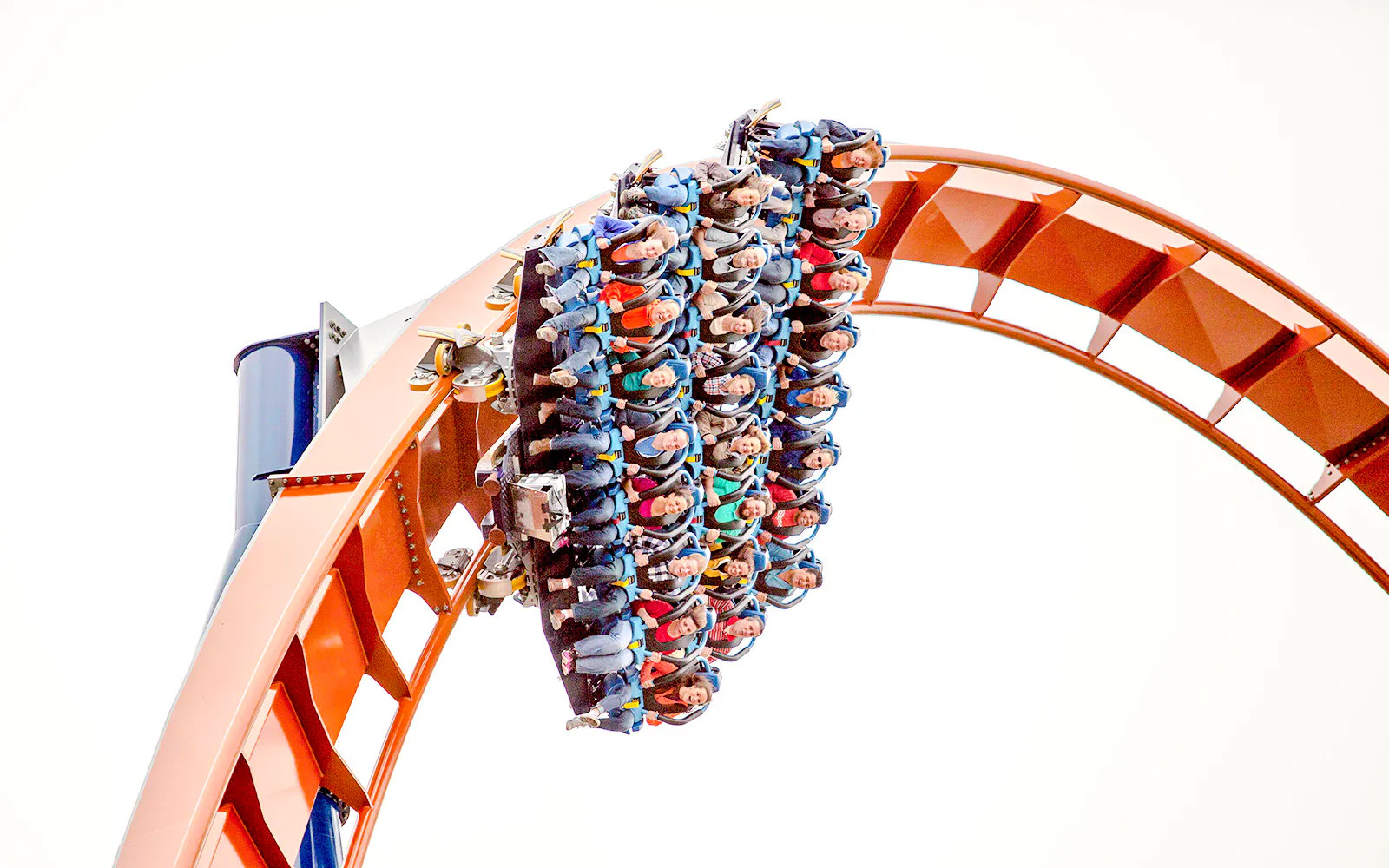 Riders on Valravn roller coaster at Cedar Point during a steep drop.