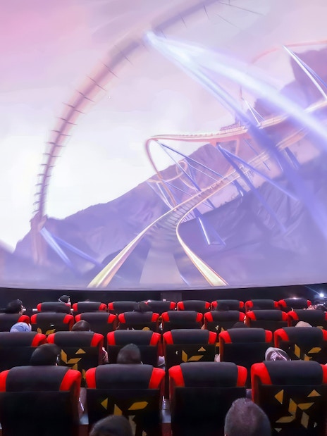 Visitors watching a roller coaster simulation at SkyDome, Langkawi.