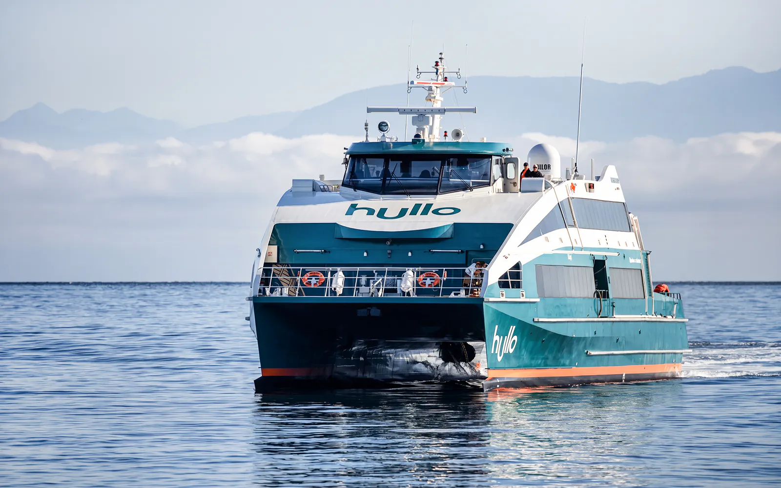 Ferry traveling from Nanaimo to Vancouver on calm waters.