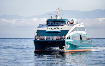 Ferry traveling from Nanaimo to Vancouver on calm waters.