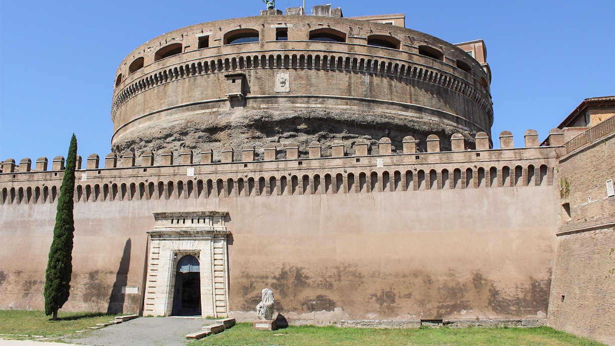 Castel Sant'Angelo exterior with entrance and statue, Rome, Italy.
