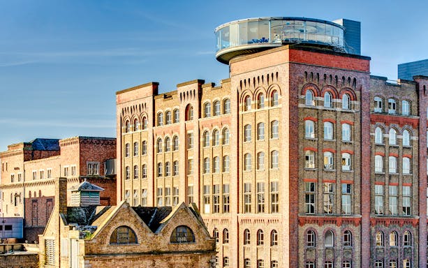 Storehouse exterior with brick facade and rooftop glass structure in Dublin.