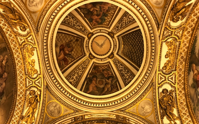 Ceiling artwork with cherubs and gold details at Palazzo Barberini, Rome.