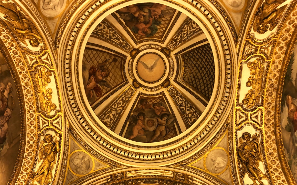 Ceiling artwork with cherubs and gold details at Palazzo Barberini, Rome.