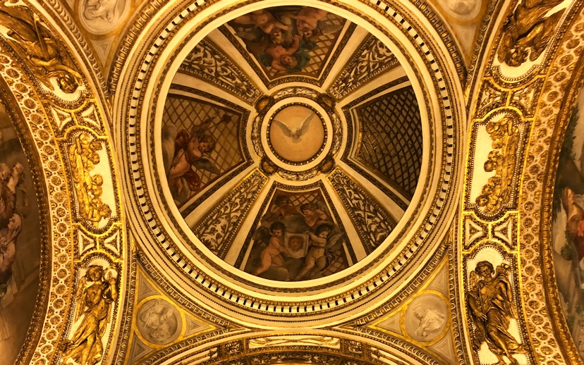 Ceiling artwork with cherubs and gold details at Palazzo Barberini, Rome.