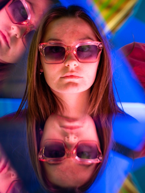Reflections of a person wearing sunglasses in The TUBE, Copenhagen.