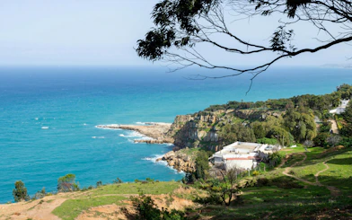 Perdicaris Park view of Tangier coastline with cliffs and ocean.