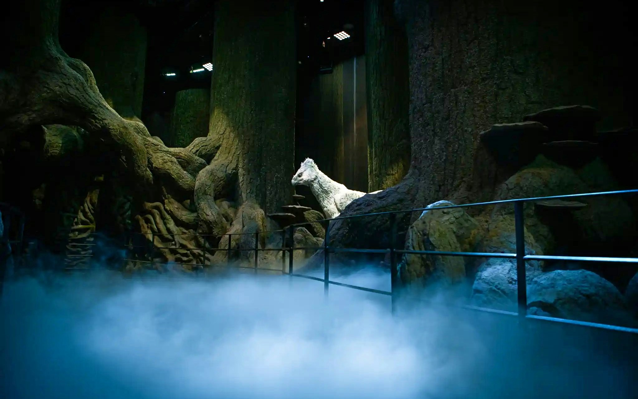 Magical forest scene with a white creature at Harry Potter™ Warner Bros. Studio Tour.