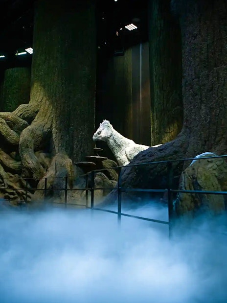 Magical forest scene with a white creature at Harry Potter™ Warner Bros. Studio Tour.