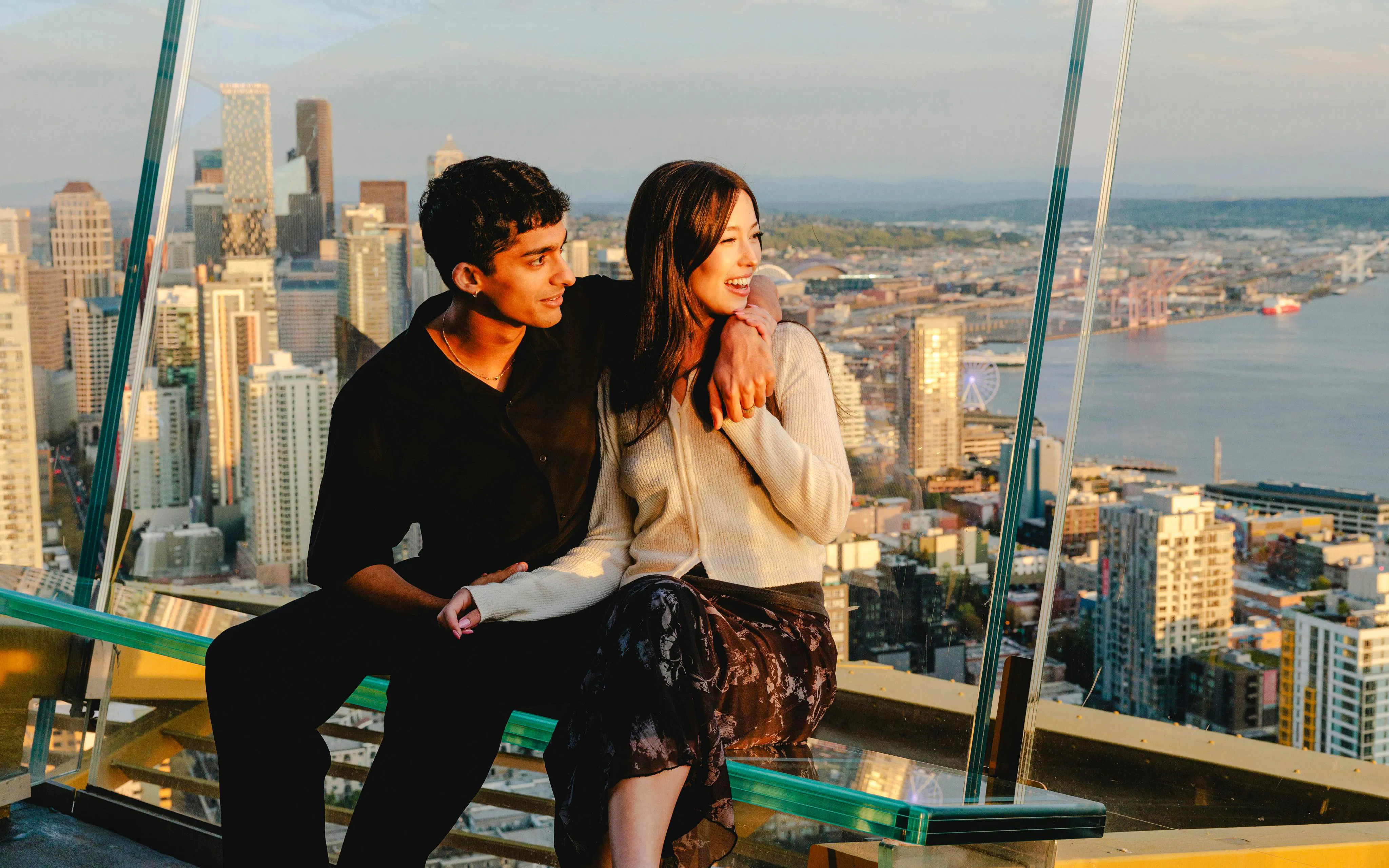 Couple enjoying the view from the Space Needle in Seattle.