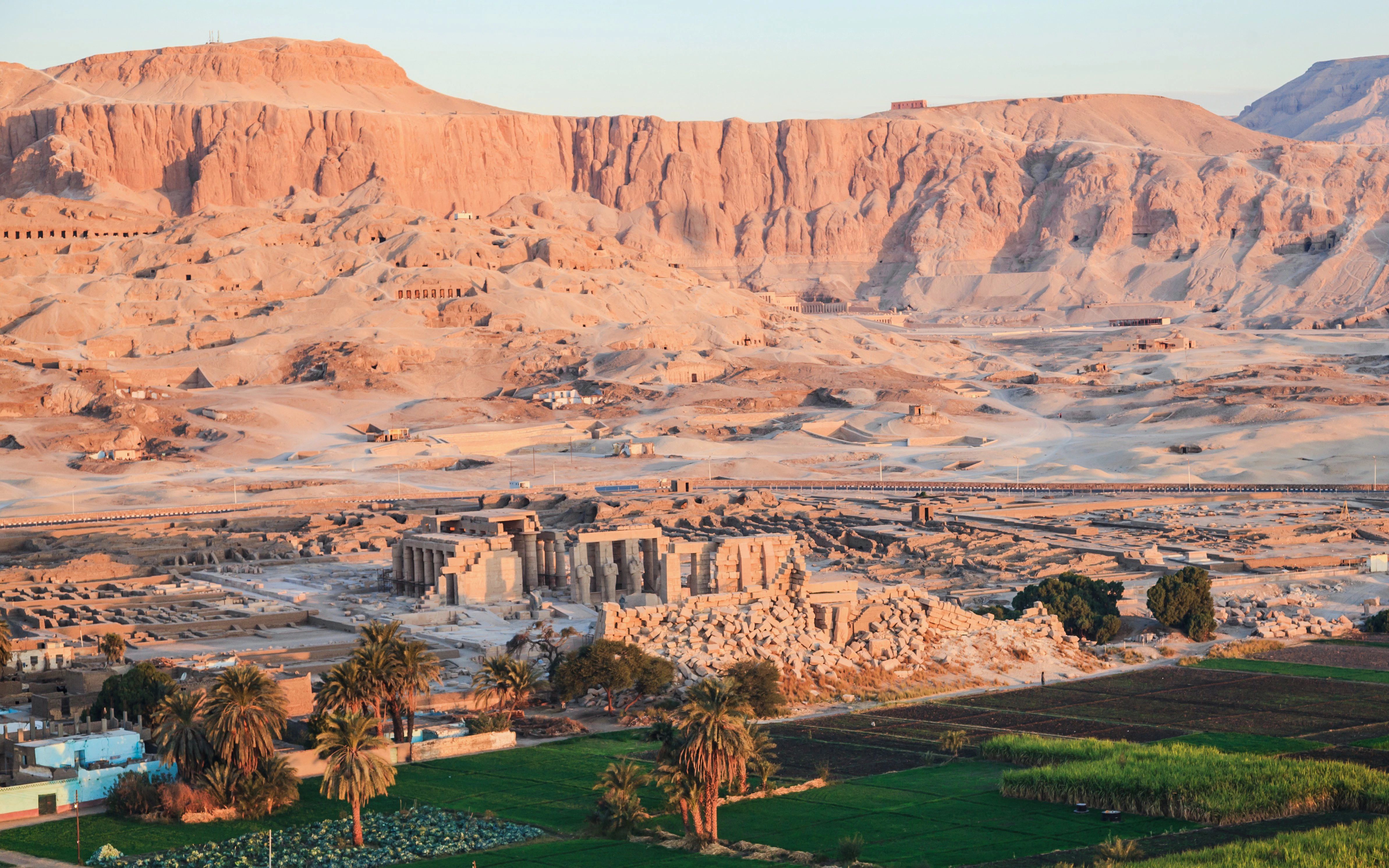 Aerial view of ancient ruins and desert landscape in Valley of the Kings, Luxor, Egypt.