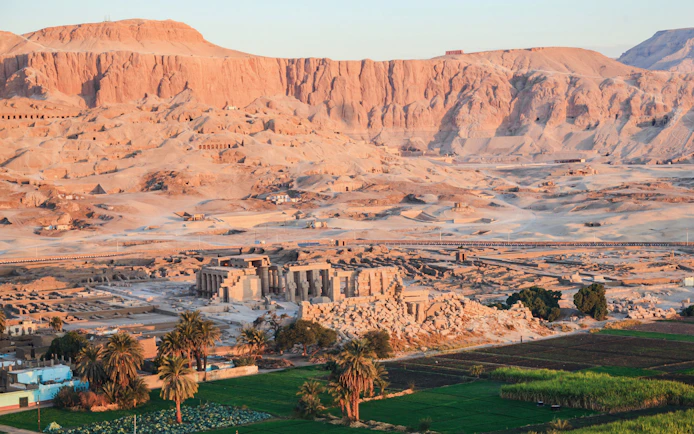 Aerial view of ancient ruins and desert landscape in Valley of the Kings, Luxor, Egypt.