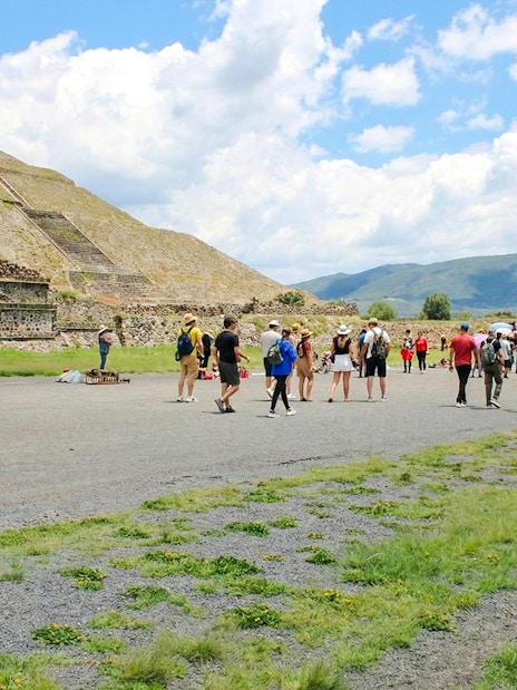 Visitors exploring the Pyramid of the Sun at Teotihuacán, Mexico.