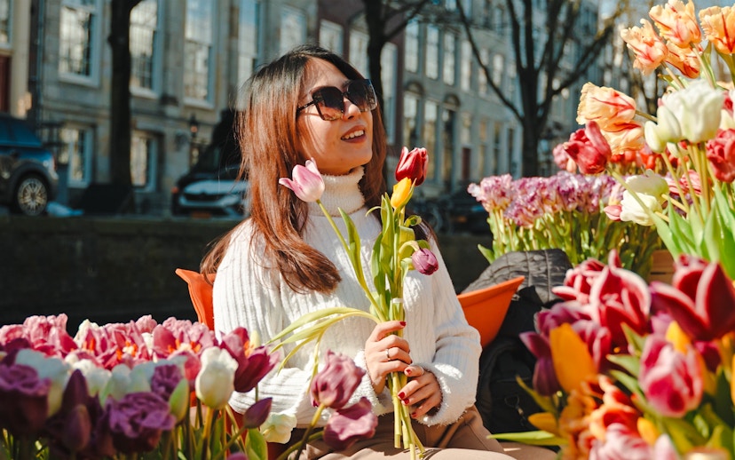 Guests enjoying tulips on a luxury cruise in Amsterdam.