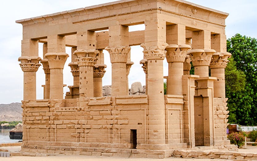 Philae Temple of Isis on Agilkia Island, Lake Nasser, with ancient columns and stone structure.