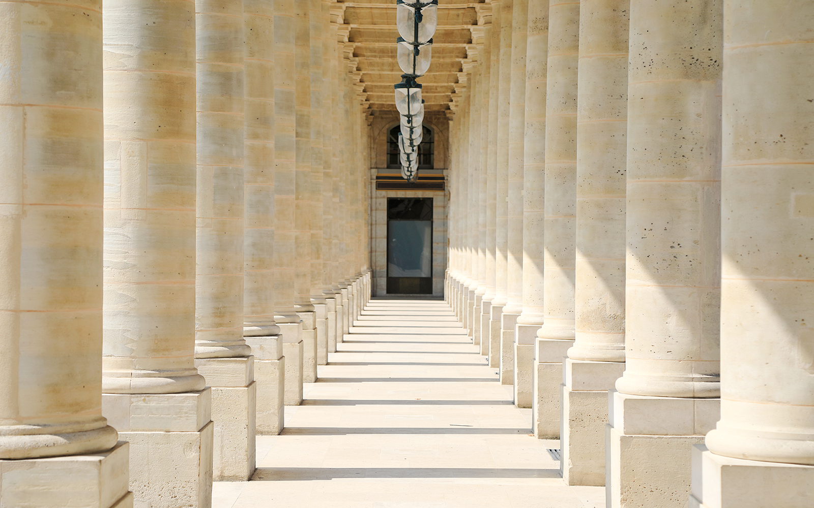 Stone columns in a row at Palais Royal, Paris.